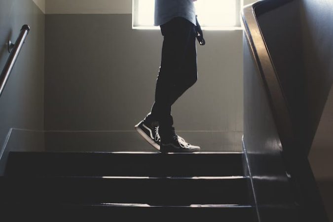 teen boy on staircase 