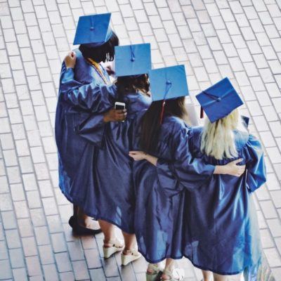 graduating seniors in caps and gowns