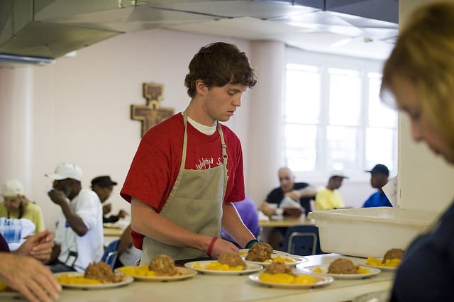 Some high schools require students to volunteer to gradate: Is that a good thing? 