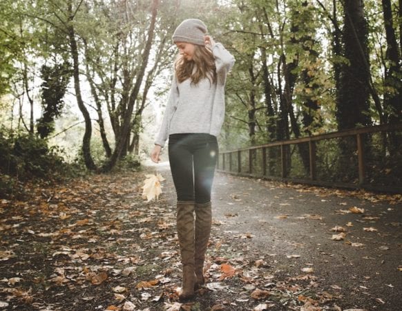 teen girl in boots walking 