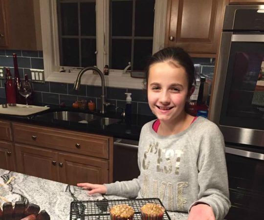 Christine Burke's daughter baking muffins