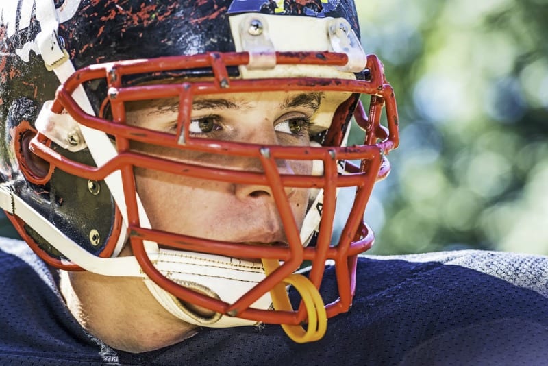 Football helmets with outside padding get tryout at high schools