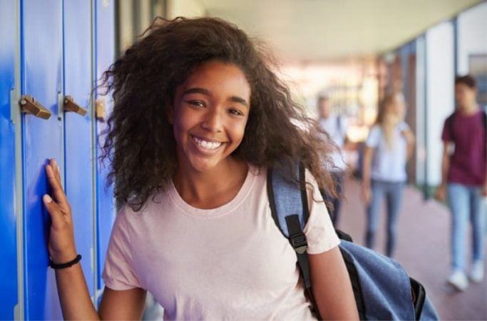 teen girl at her locker 