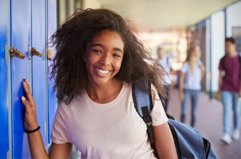 Teen girl picking her nose Stock Photo