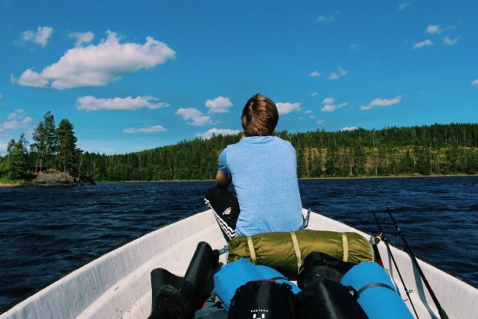 teen in a boat 