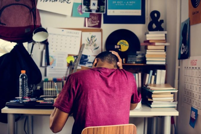 teen in their room alone