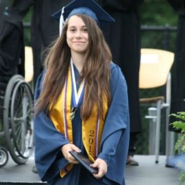 Teenage girl graduating