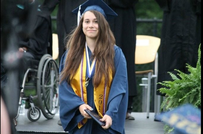 Teenage girl graduating