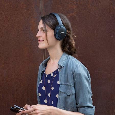 girl wearing Bose headphones 