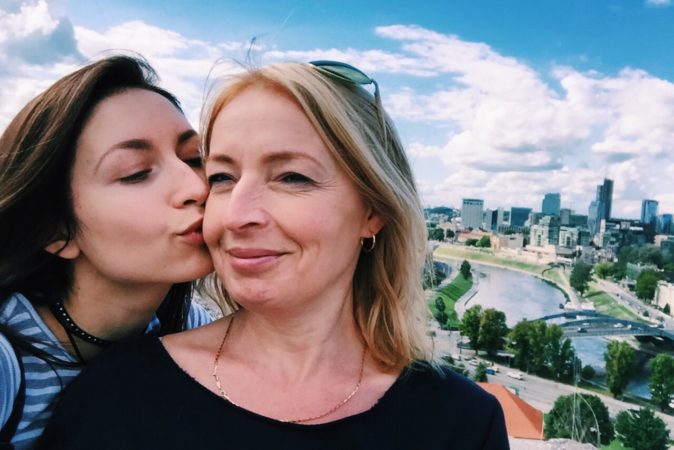 mom and daughter kiss 