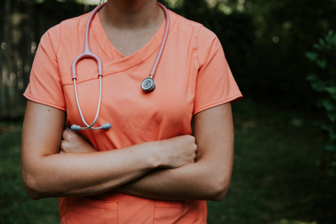 nurse in organic scrubs 