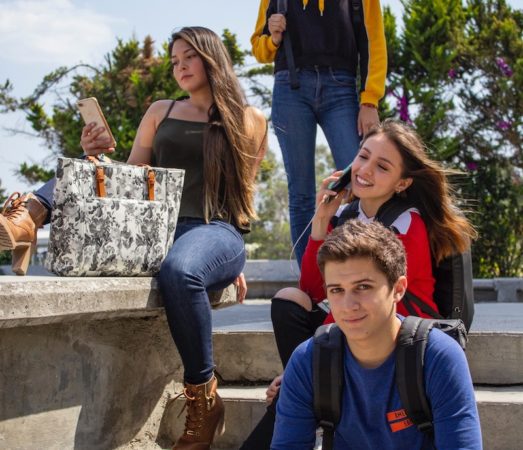 teens sitting on stairs 