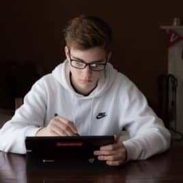 teen with computer