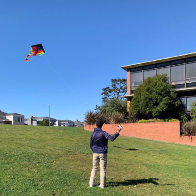 boy flying kite