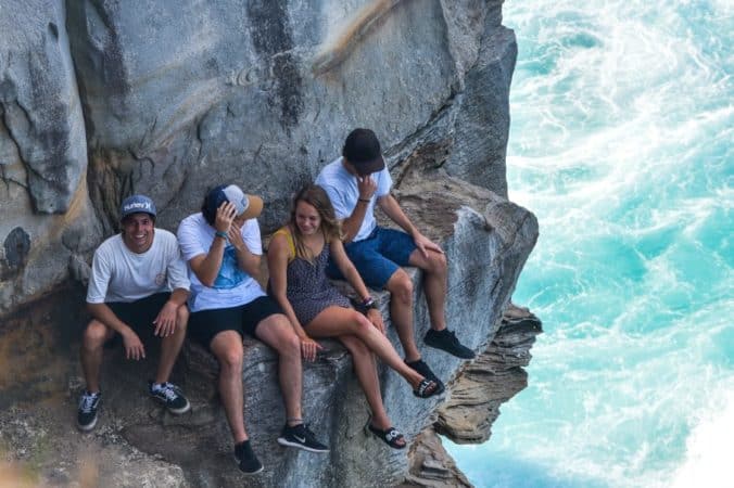 group of 20 year olds on a cliff 