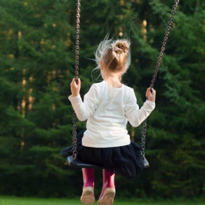 little girl on swing