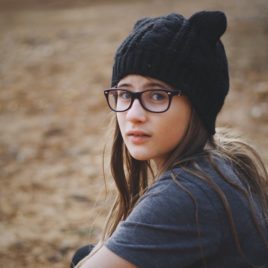 teen girl in hat