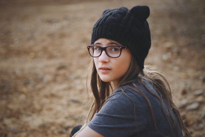 teen girl in hat 