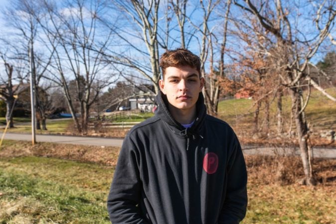 teen boy on road 