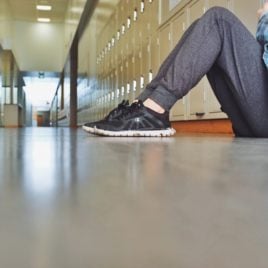 teen girl in school hallway
