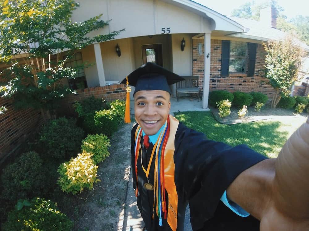 grad taking a selfie