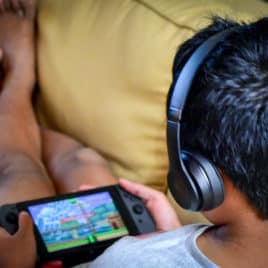 boy playing video game