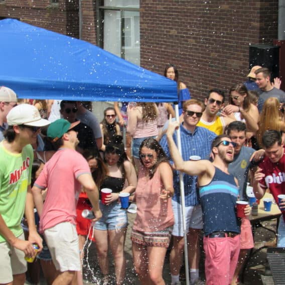 students drinking at outdoor college party