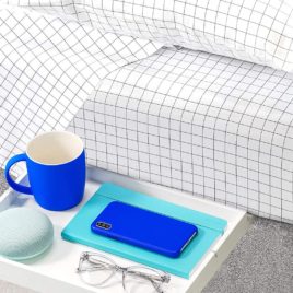dorm bed shelf with blue mug