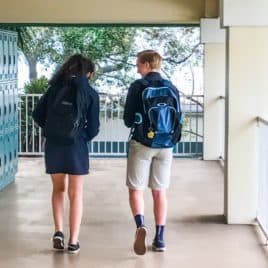 boy and girl in hallway of school