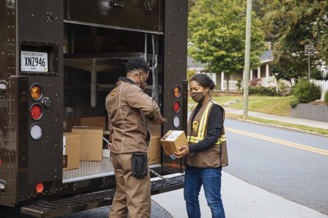 UPS to hire over 100,000