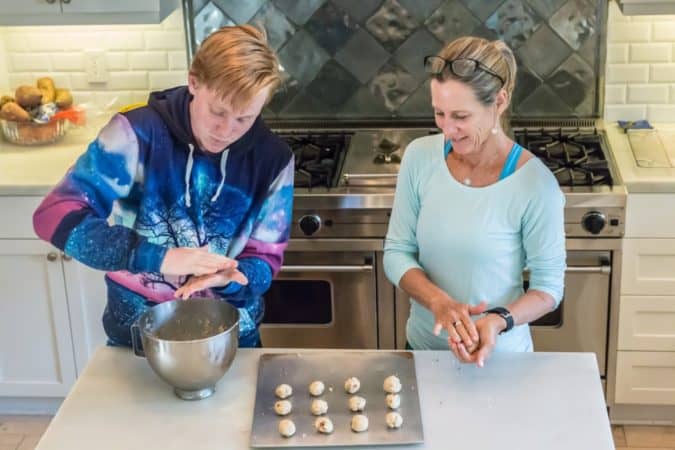mom and son baking cookies