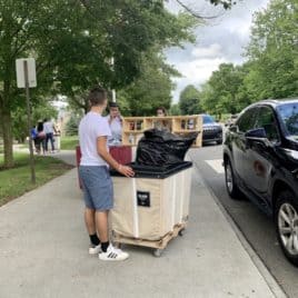 family helping son move into college
