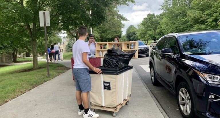 family helping son move into college