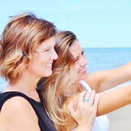 mom and daughter taking selfie