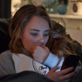 teen girl on her phone