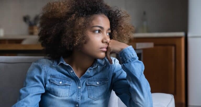 black teen girl pensive