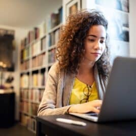 young woman in college library