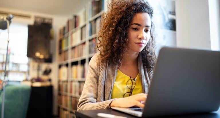 young woman in college library