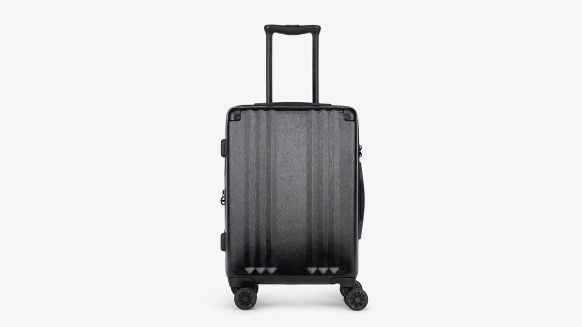 Calpak Ambeur 22-inch rolling spinner carry-on