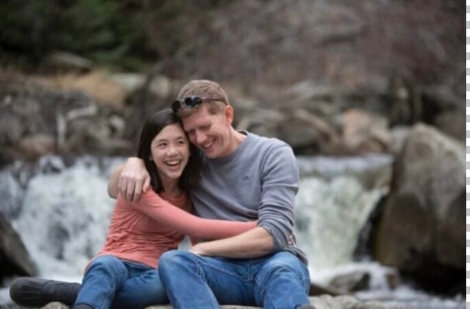 dad and daughter hugging